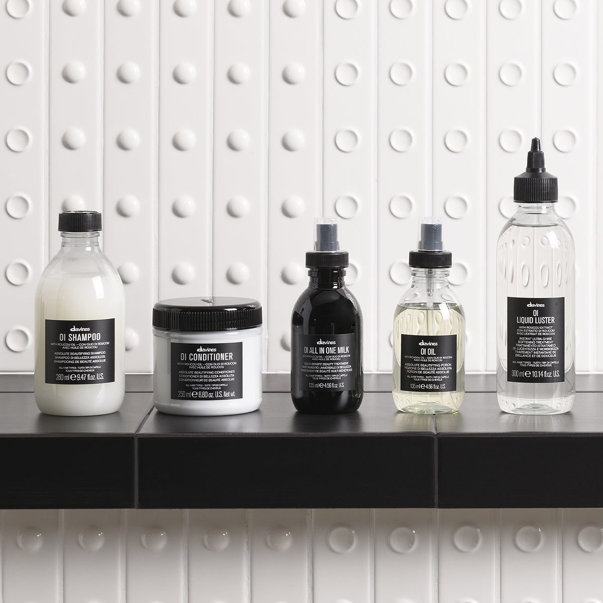 Davines OI All In One Milk - Leave-in hydrating treatment controls frizz, protects from heat, and adds shine and softness