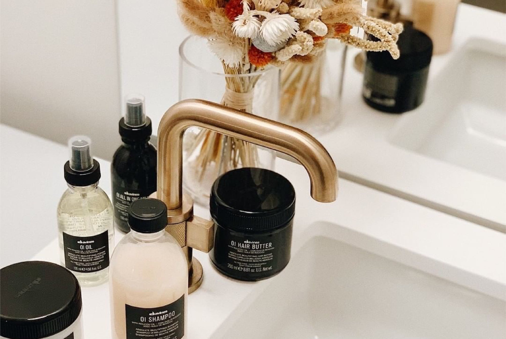 Davines OI products in a bathroom