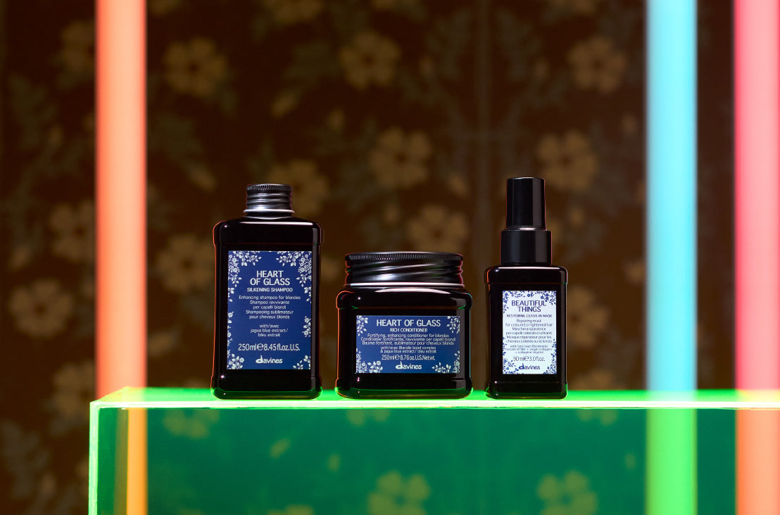 Davines Heart of Glass products next to the Restoring Leave-In Mask