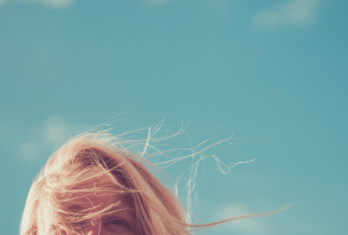 A close up of a blond woman's hair
