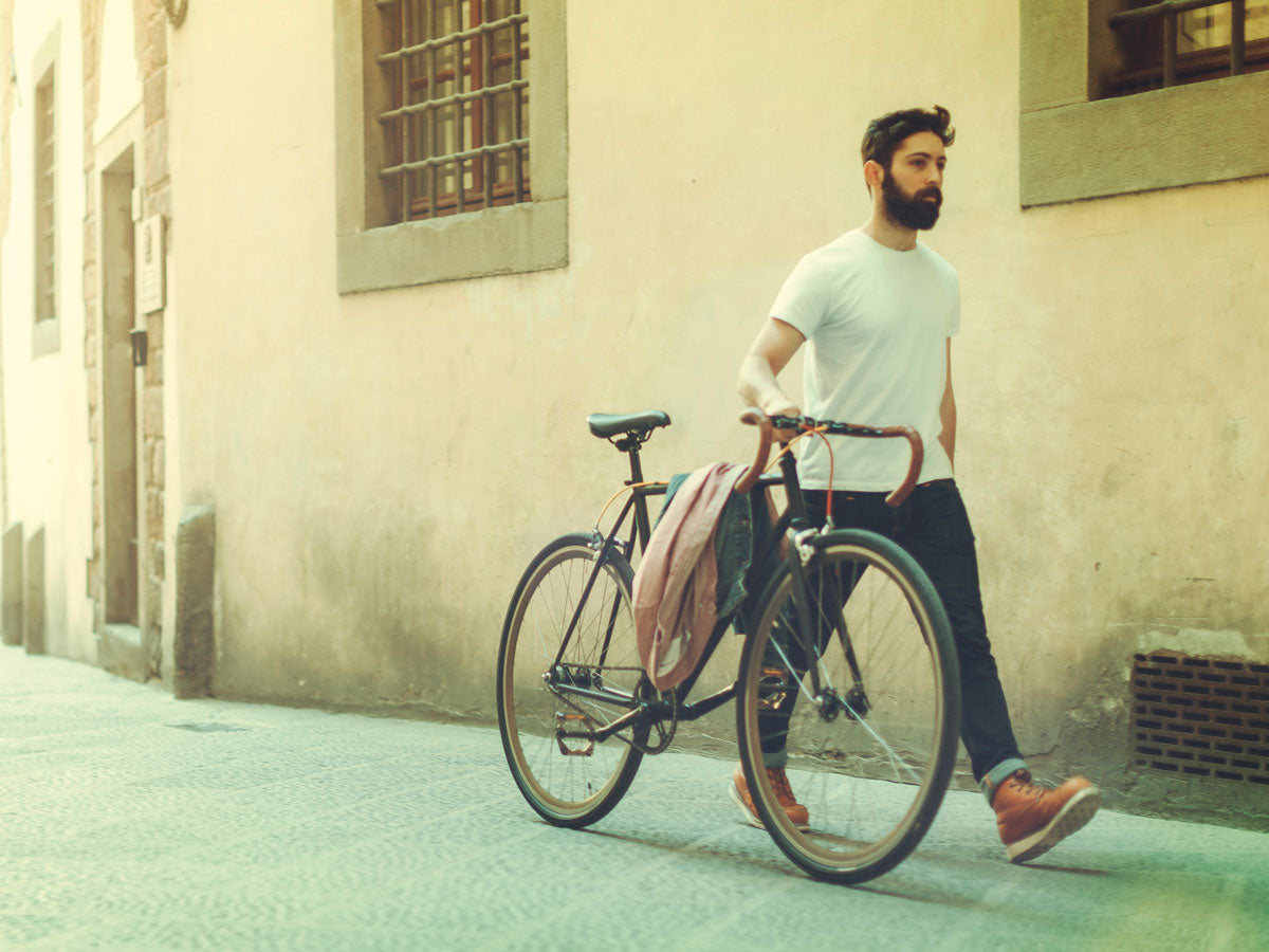 image of a man with a bike
