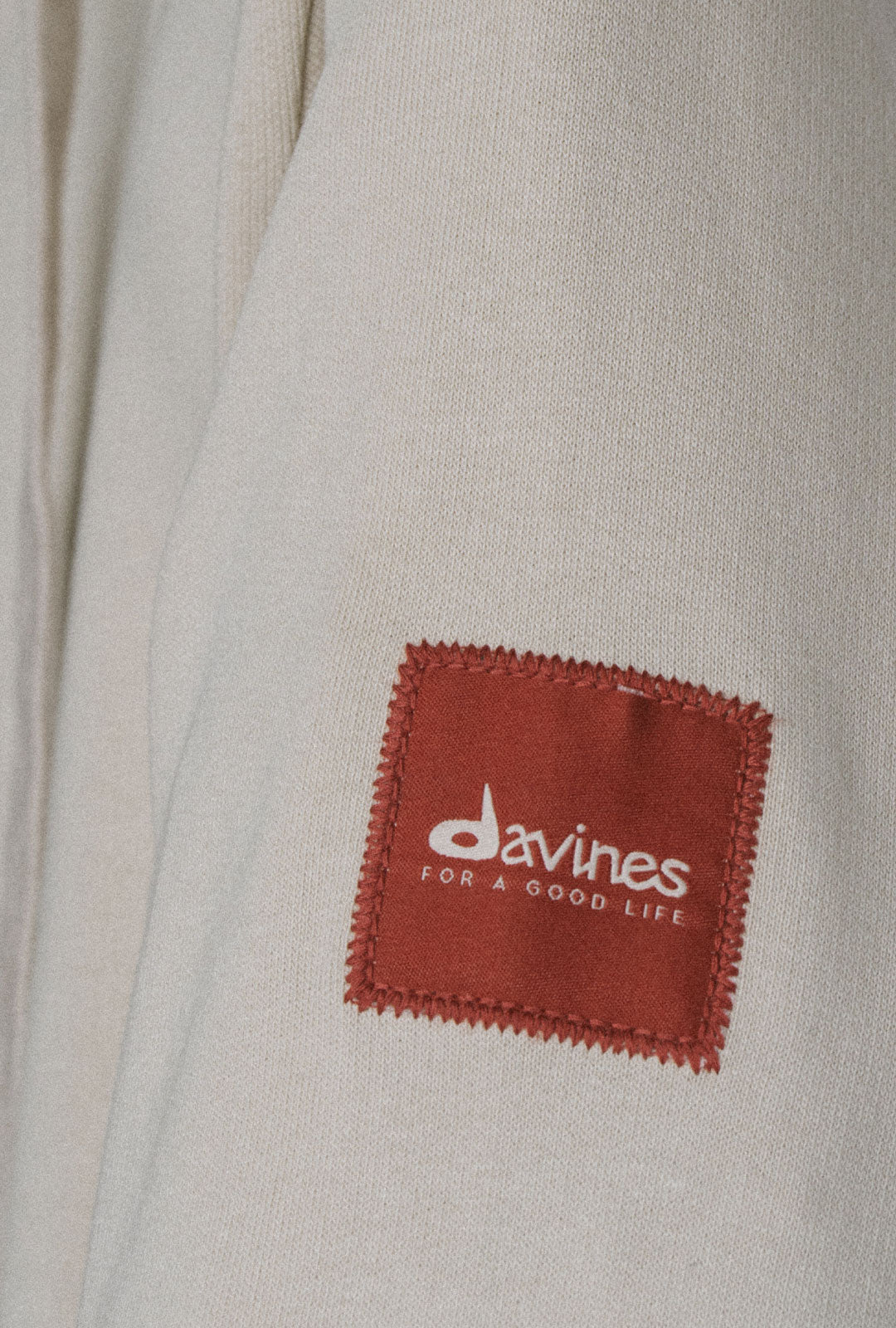 
Davines Regenerative Organic Cotton Hoodie - Crafted from Regenerative Organic Certified Cotton and grown by indigenous farmers in Odisha, India, this represents a commitment to soil health, biodiversity, and the communities who cultivate it.
Effortlessly refined, this hoodie pairs everyday comfort with quiet, purposeful detail: a subtle logo accent on the upper sleeve and a discreet inner pocket for life's essentials.    
Care Instructions:Machine wash cold, gentle cycle, with like colors. No bleach. Tumble dry low and remove promptly, or hang dry. Iron on reverse, low heat. Do not dry clean.